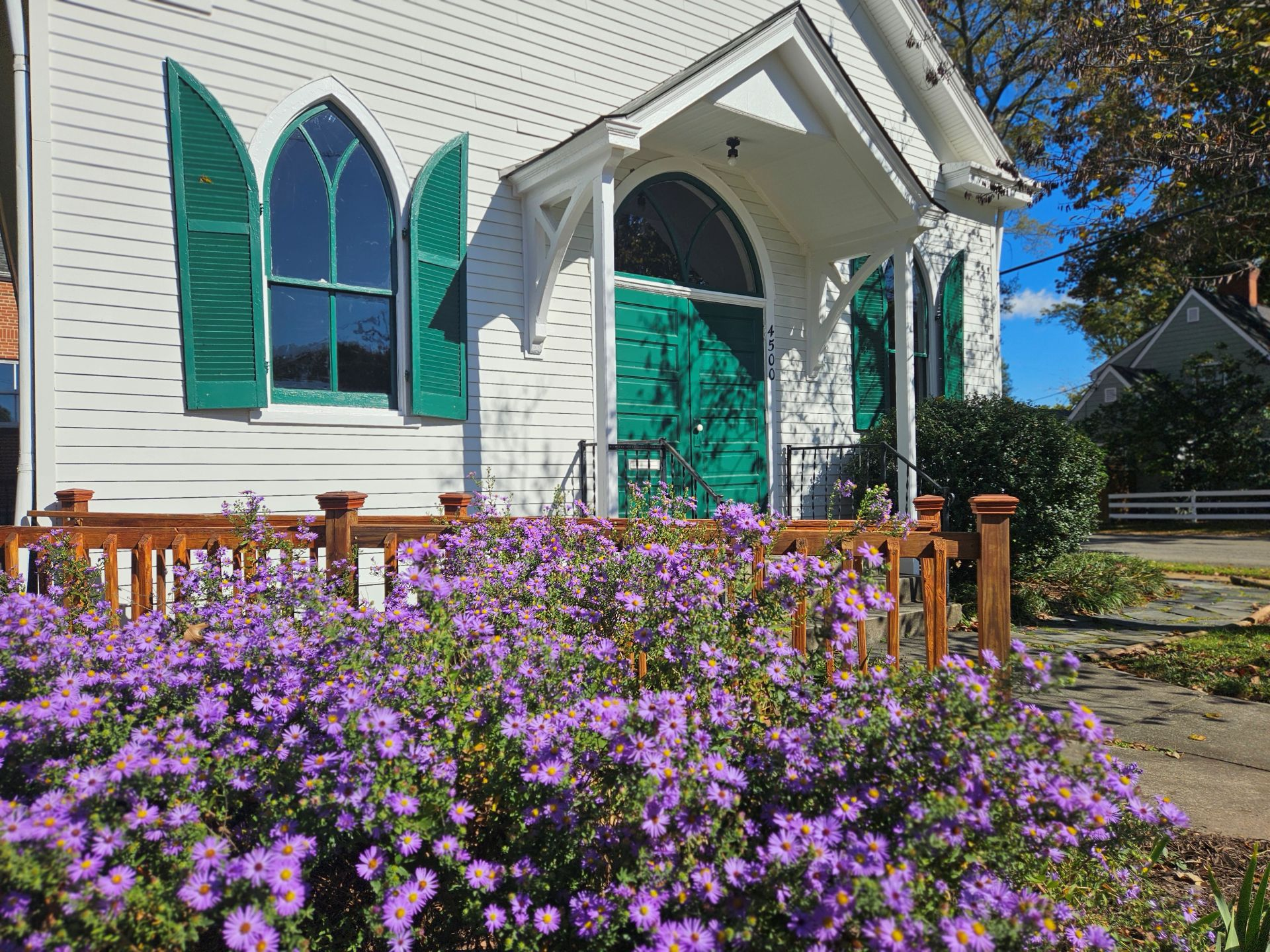 front-of-meetinghouse-and-asters-edited-1.webp